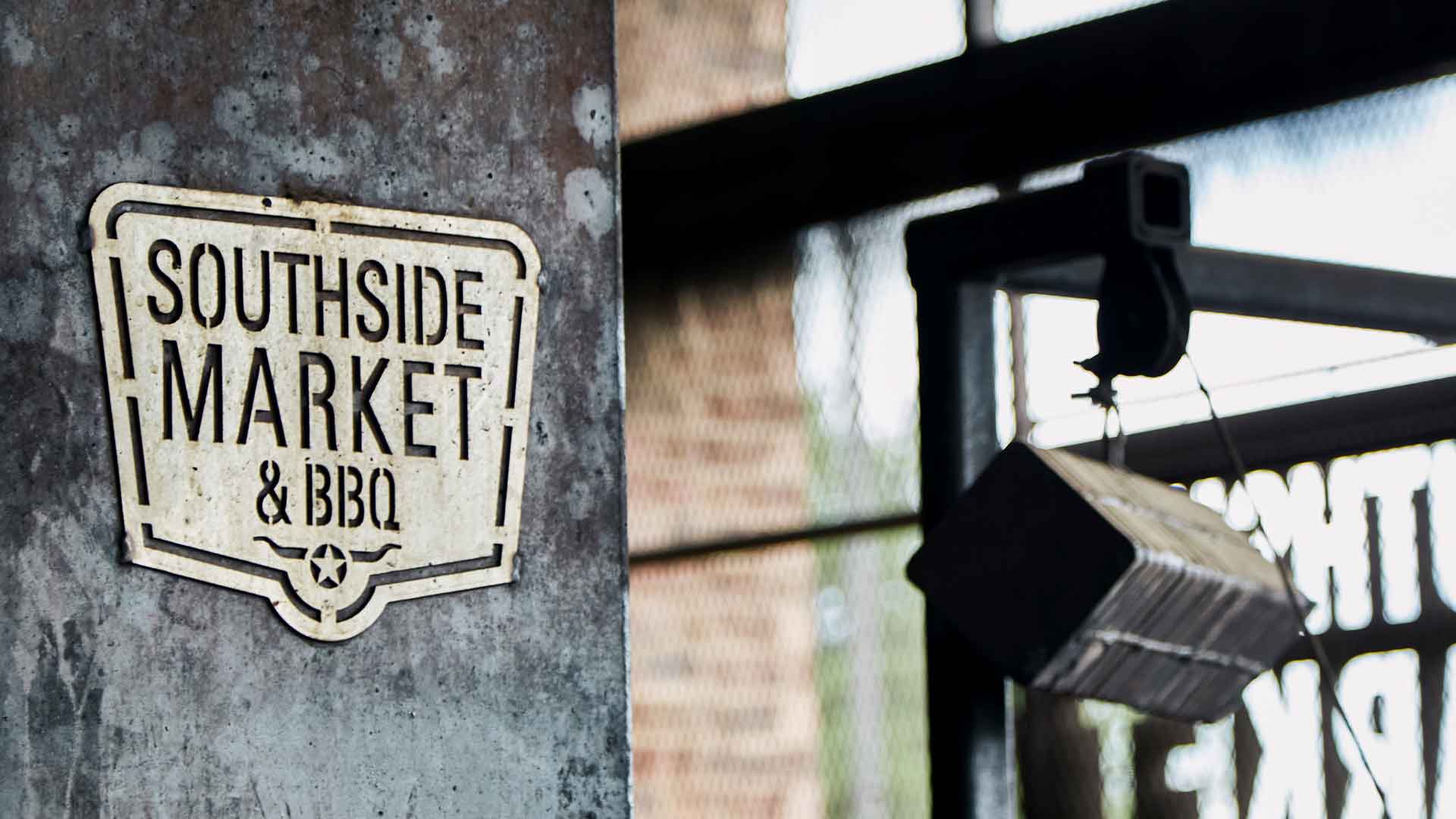 Steel logo signage from the pit room at Southside Market & Barbeque's Arbor Walk location